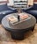 Striking and sculptural, this Bernhardt round coffee table features a richly textured black raffia finish with a bold...