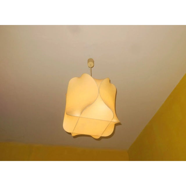 Cocoon pendant light, design similar to lighting by Achille Castiglione, Italy 1960s, made of resin stretched over a metal...