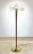 A hard to find floor lamp by Lightolier circa 1960’s The lamp features a newly restored tapered stem in walnut with brass...