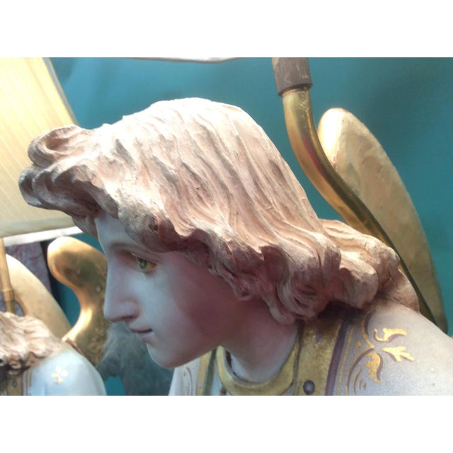 Beautiful hand carved and painted antique wood angels now French mounted as lamps. Chips and cracks and the wings have...