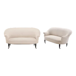 A Pair of French Napoleon III Sofas With Continuous Backs, C. 1860.