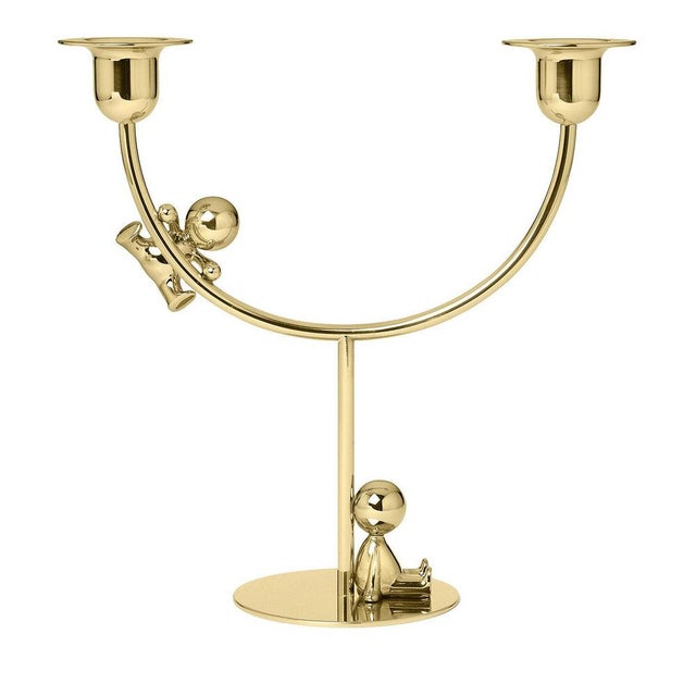 Marked by a timeless minimalist aesthetic, this sculptural double candlestick is a modern take on a traditional piece of...