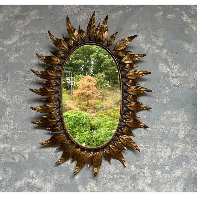 1950s Spanish Oval Gilt Metal Sunburst Mirror With Alternating Leaves For Sale - Image 5 of 13