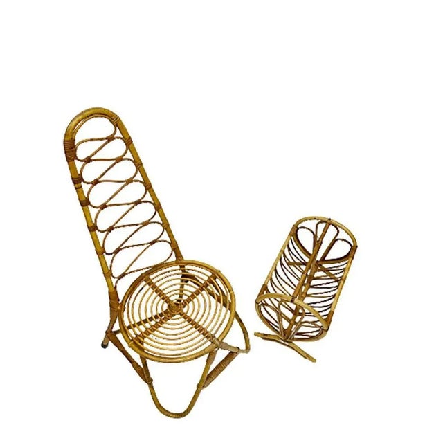 Mid-20th Century rattan and bamboo set of a chair and a magazine rack High back with low seated rattan and bamboo chair...