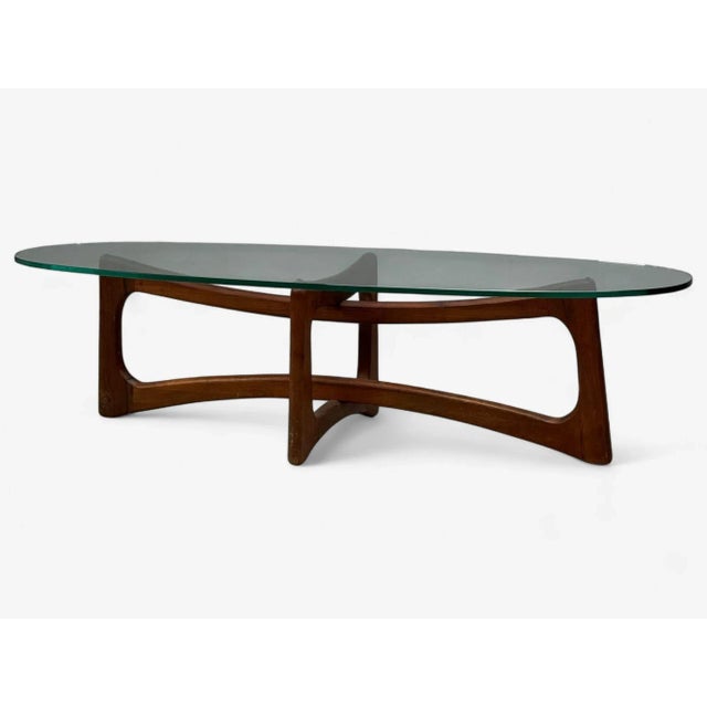 Adrian Pearsall, American Mid-Century Modern, Walnut, Glass, Coffee Table, United States, 1960s A bowtie form walnut and...