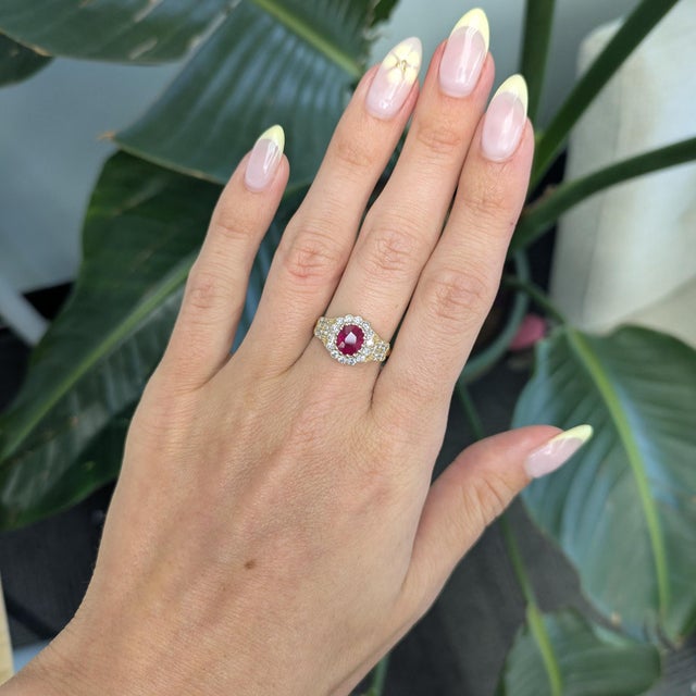 1.5 ct Burma Ruby ring showcasing a vivid 7×6 mm centerpiece, accented with earth-mined diamonds for radiant contrast....