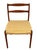 This mid-century Danish modern dining chair features a wood ladder-back frame paired with a woven paper cord seat in a...