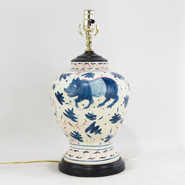 This pair of vintage Brunschwig & Fils Cadiz table lamps features a classic ceramic body finished in a warm, antiqued...