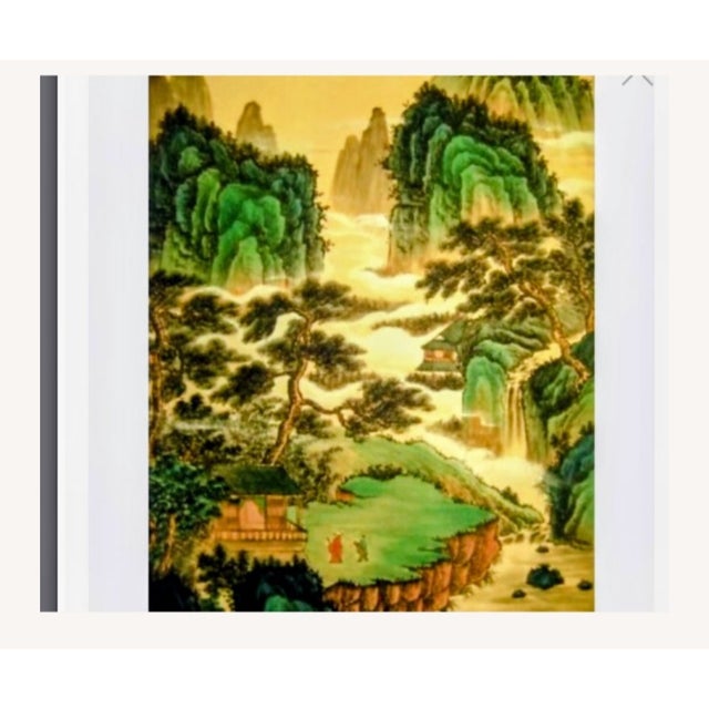 Gorgeous rich scroll with green and brown mountain terrain.