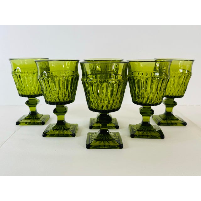 Vintage 1970s Green Footed Glass Goblets, Set of 6. Heavy and solid glass goblets with a beautiful green color. No marks.