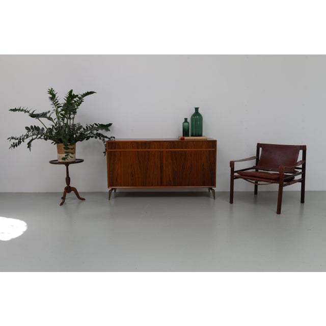Danish Mid-Century Rosewood Sideboard, 1960s. Stunning Scandinavian Modern rosewood/palisander cabinet with vivid grain...