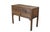 This mid-19th century versatile side table made from walnut wood features a classic three-drawer configuration, with two...