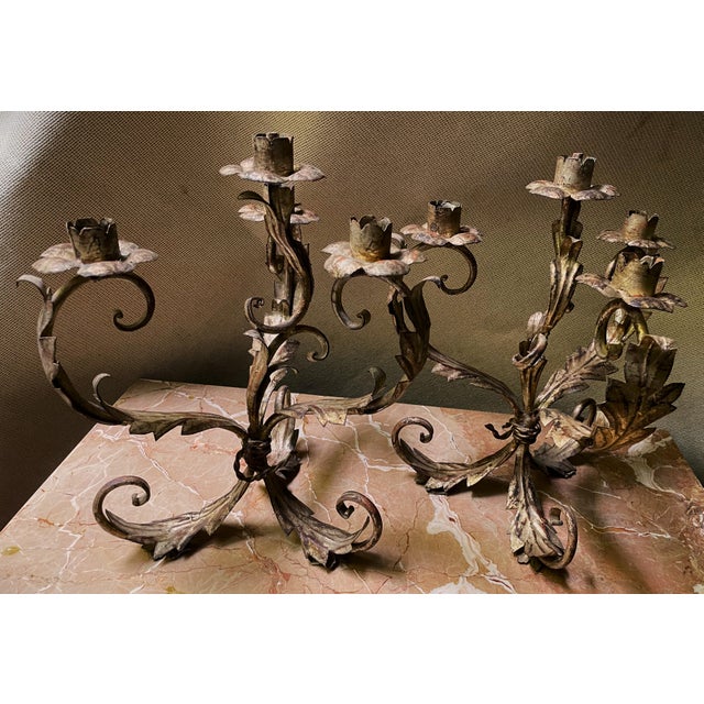 A vintage pair of lovely and intentionally worn, warm Italian silver gilt 4 light candelabras with acanthus leaf and...