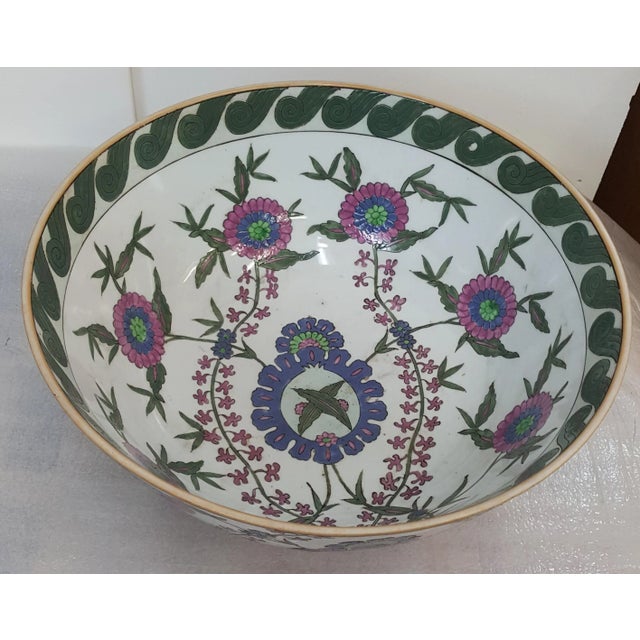 Showroom display piece. Lovely China Porcelain bowl from Payne Imports Floral design with Purple, Green, Blue, and White...
