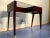 Stylish Italian Mid-Century Modern petite desk elegantly named ''Dattilo'' in wood teak designed by Vittorio Dassi, from...