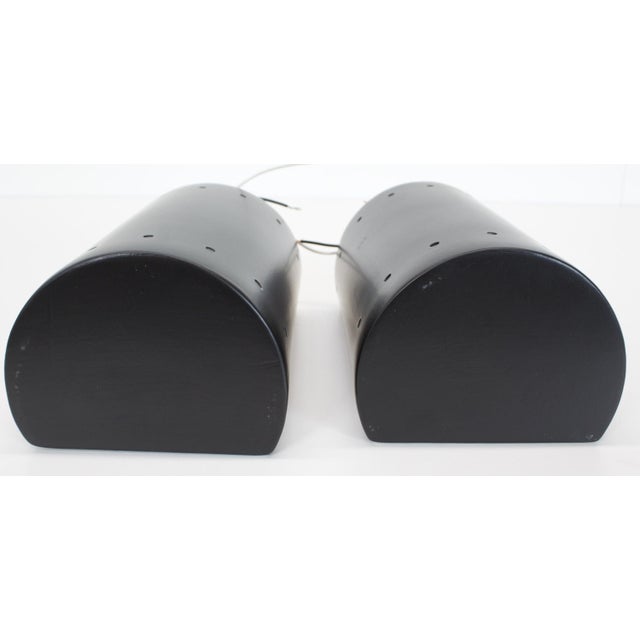 Price is for the pair. Hand crafted ceramic cylinder wall sconces made by Justice Designs LLC Los Angeles. One end is...