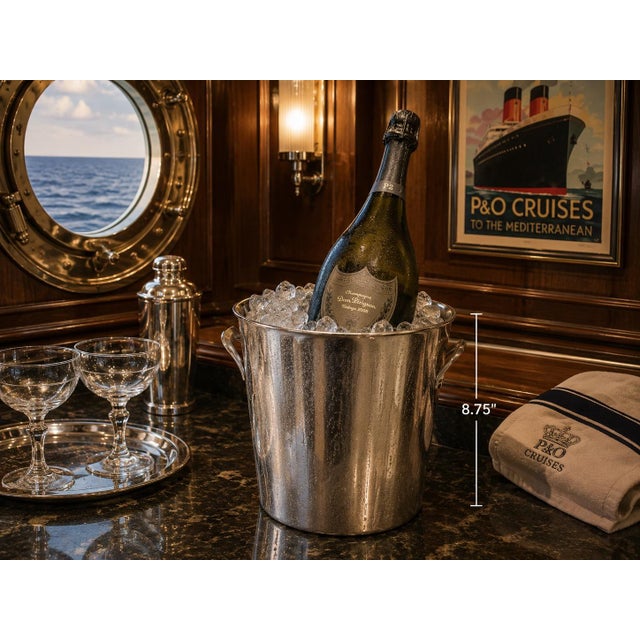Early 20th century P&O cruise ship champagne bucket by Elkington, one of England’s most celebrated silversmiths. Crafted...