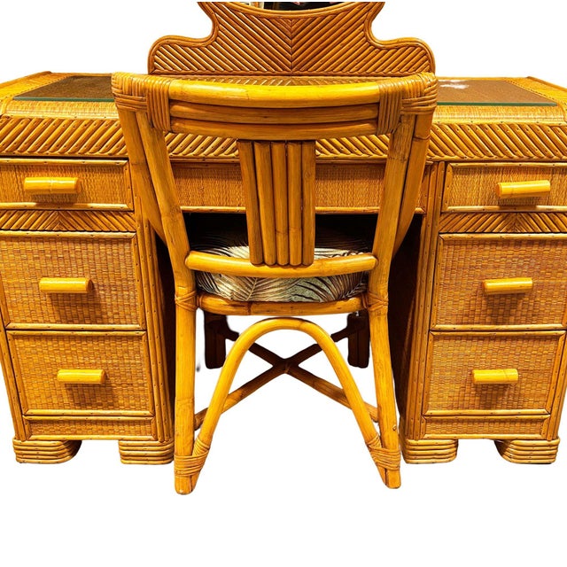 This beautifully restored stick reed rattan vanity with chair blending coastal style with Art Deco design. It features a...