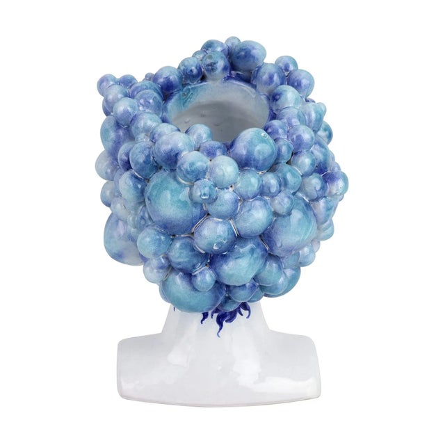 A showpieces for your home or garden, the Sicilian Heads Blue Bubble Head brims with impeccable detail and rich, lush...