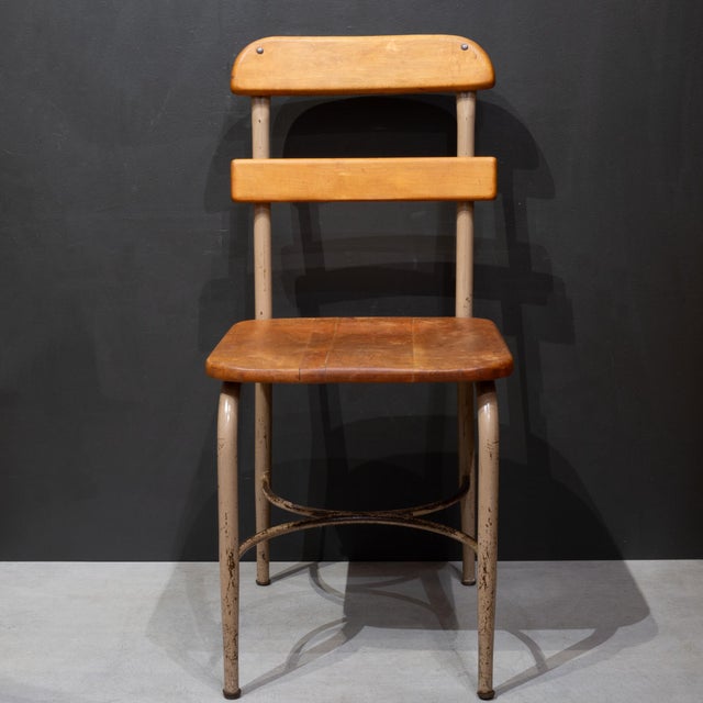 ABOUT Solid as a pair only. A pair of solid maple, mid-century classroom chairs featuring contoured solid wood seat and a...