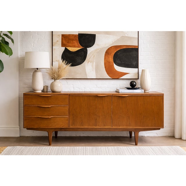 Sculptural + Funky Mid Century Modern styled Credenza / Media Stand with loads of storage space in the three deep +...