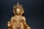 A magnificent gilt bronze statue of Tibetan Buddha Udanaya. Poised upon a large lotus plinth, the Buddha is depicted in...