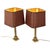 Pair high-quality mid-century design brass table lamps with their original burgundy-colored square lampshades with a gold...