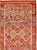 This mid-20th-century Turkish Anatolian runner presents a vibrant allover lattice of diamond-shaped compartments arranged...
