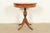 A gorgeous Georgian or Regency style pedestal drum side table or tea table In the manner of Baker Furniture USA, Circa...