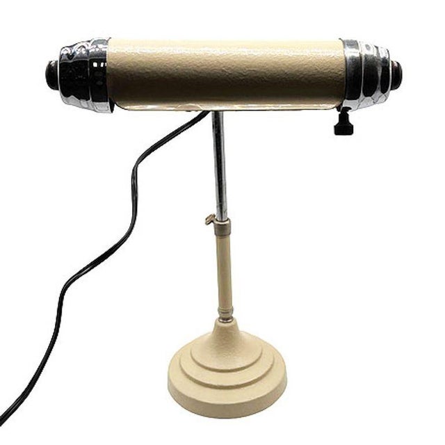 Streamline Art Deco styled chrome & enameled Bankers Desk Lamp by Radionic Trans Co. The lamp features Enameled steel...
