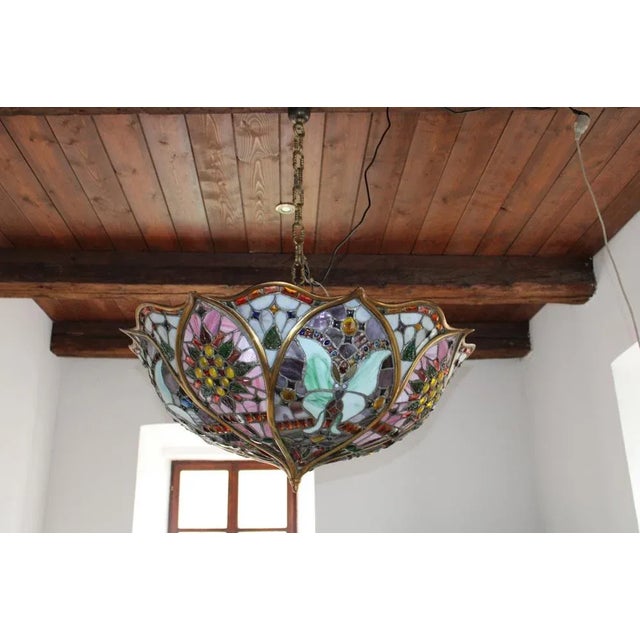 Stained Glass Chandelier in the style of Tiffany, 1975, in Flawless conditions. Designed 1970 to 1979 European Plug (up to...