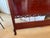 Solid rosewood full size headboard with double-arched crest, carved shell and leaf motifs, pierced scroll band, and...