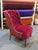 Custom designed and reupholstered bohemian style accent chair. Beautiful maroon velvet on the front with a colorful...