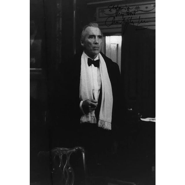 Vintage Photo. The English Actor Christopher Lee. with a reproduced dedication (not original) by Lee. Fair conditions,...