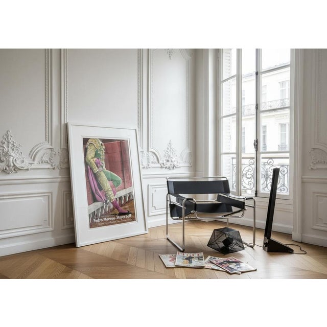 The poster is sold unframed. Any frame shown in the photo is for display purposes only and is not included