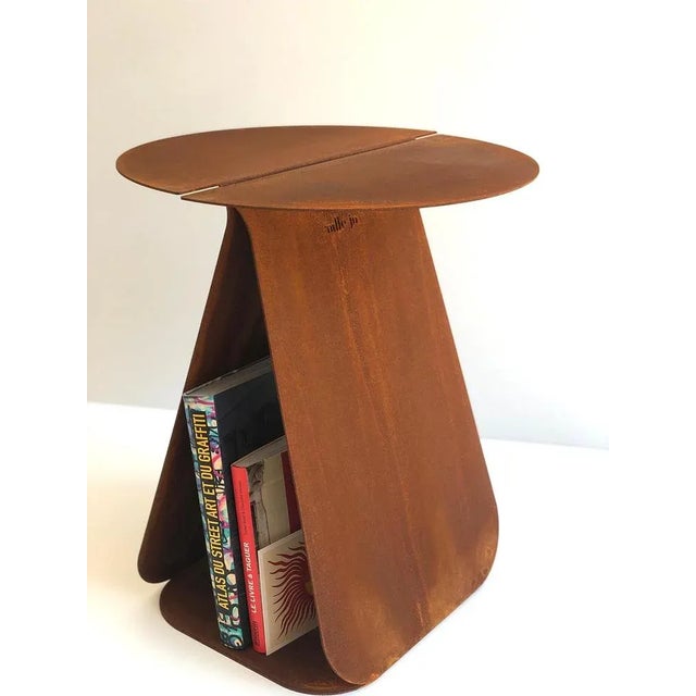 Youmy round corten table by mademoiselle jo dimensions: ø 36 x h 43 cm. Materials: corten steel. Also available in...
