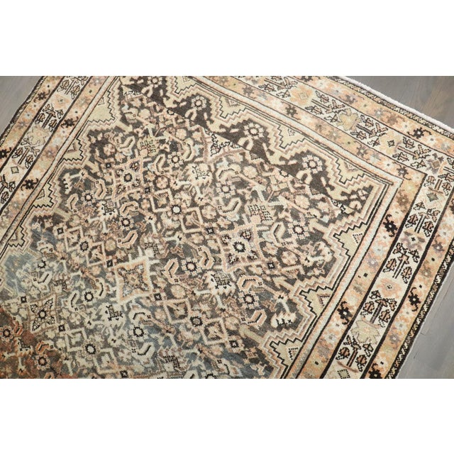 An early 20th century Malayer small square rug
