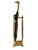 A refined vintage brass umbrella stand featuring a sleek, architectural silhouette with elegant finial details and a warm...