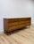 This vintage mid-century modern dresser reflects the classic Bassett lowboy silhouette, prized by collectors for its...