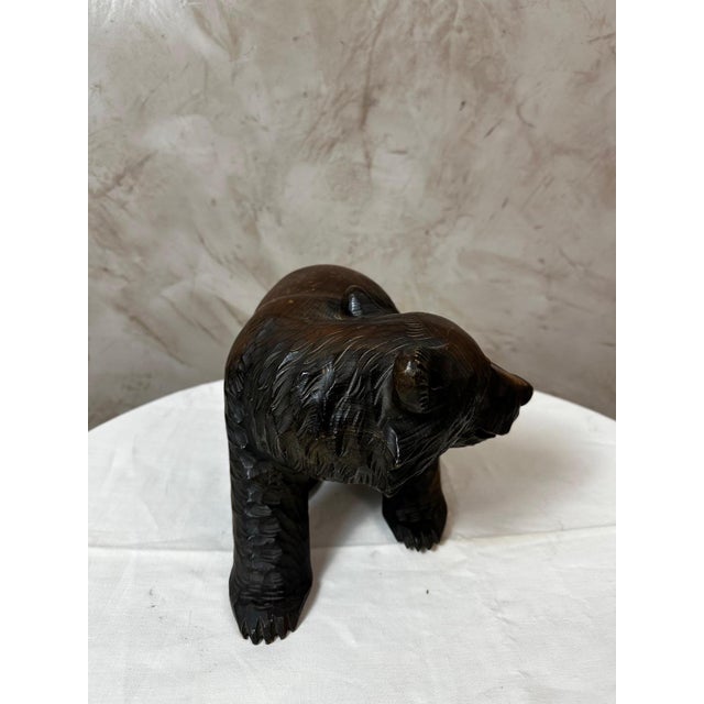Charming wooden sculpture of a bear, crafted in the 1960s using traditional Japanese techniques. This piece, finely carved...