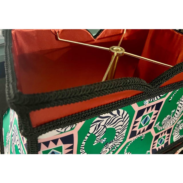 This eclectic vintage lampshade frame, likely dating back to the 1960's/70's, blends grandmillennial charm with bohemian...