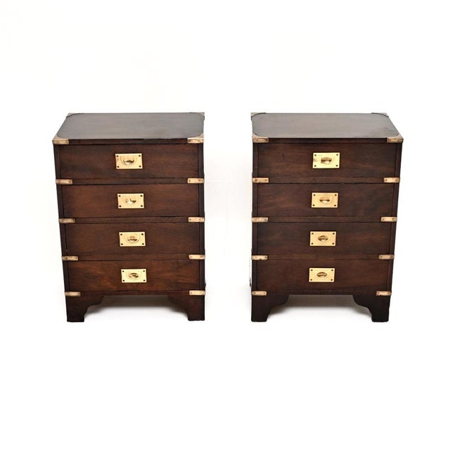 A very smart pair of antique military campaign style bedside chests. They were made in England, they date from around the...