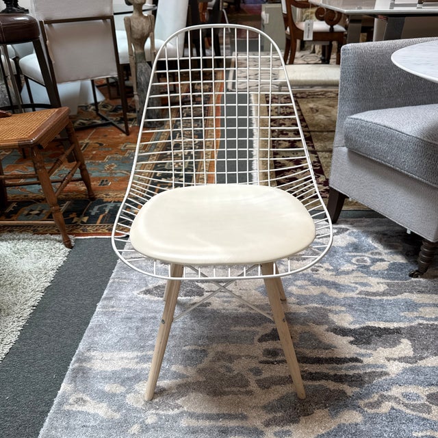 Design Plus Gallery present the Wire Back Side Chair in the Style of Eames. The chair is a staple piece for any mid 20th...