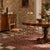 Pair of high-back chairs made in Italy in the 1950s, featuring an elegant brass frame. The seats are upholstered with the...