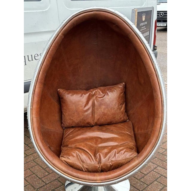 Swivel Egg Chair with Tan Leather Upholstery from Aviation For Sale - Image 6 of 9