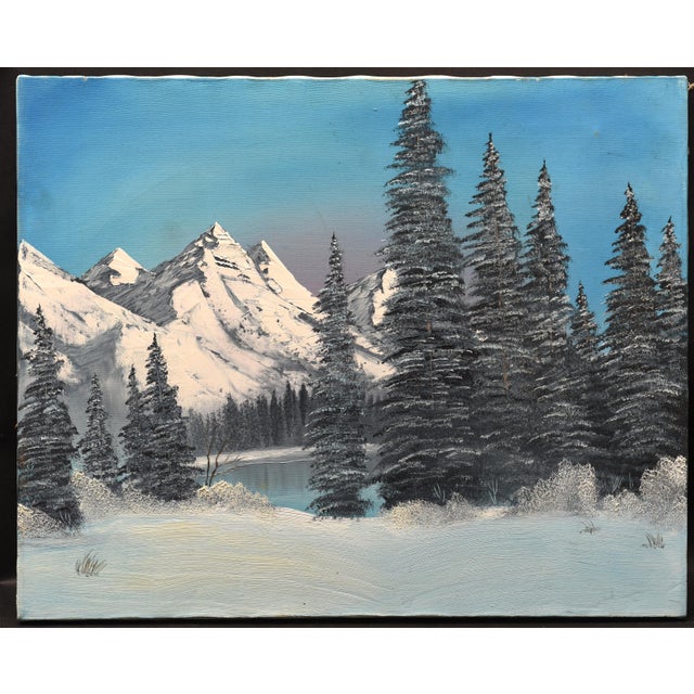 This serene winter landscape painting captures the beauty of a snow-covered mountain range and a tranquil lake. The artist...