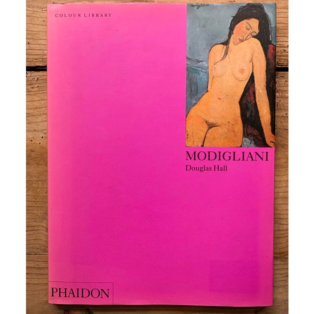 Phaidon Colour Library volume on Modigliani by Douglas Hall, featuring the series’ iconic bright pink cover with a detail...