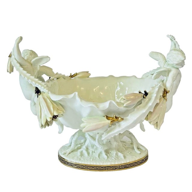 For you to consider is a rare and exquisite Moore Brothers English porcelain centerpiece bowl from their legendary cherub...