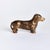 Made of a heavy cast aluminum, this regal dachshund sculpture is worthy of a prime bookshelf spot. With realistic...