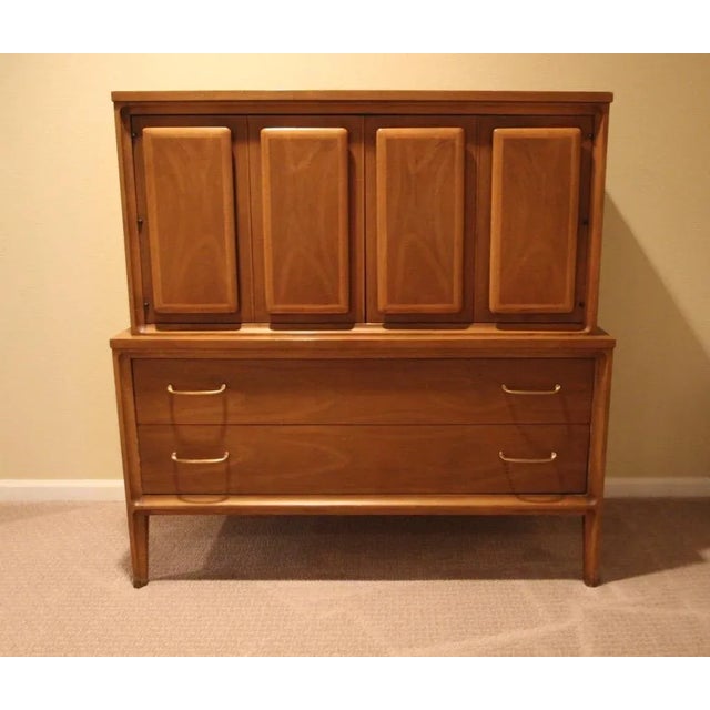 Rare Forward 70 Broyhill Premier dresser. American walnut - combination solid wood structure and veneer - with rounded...
